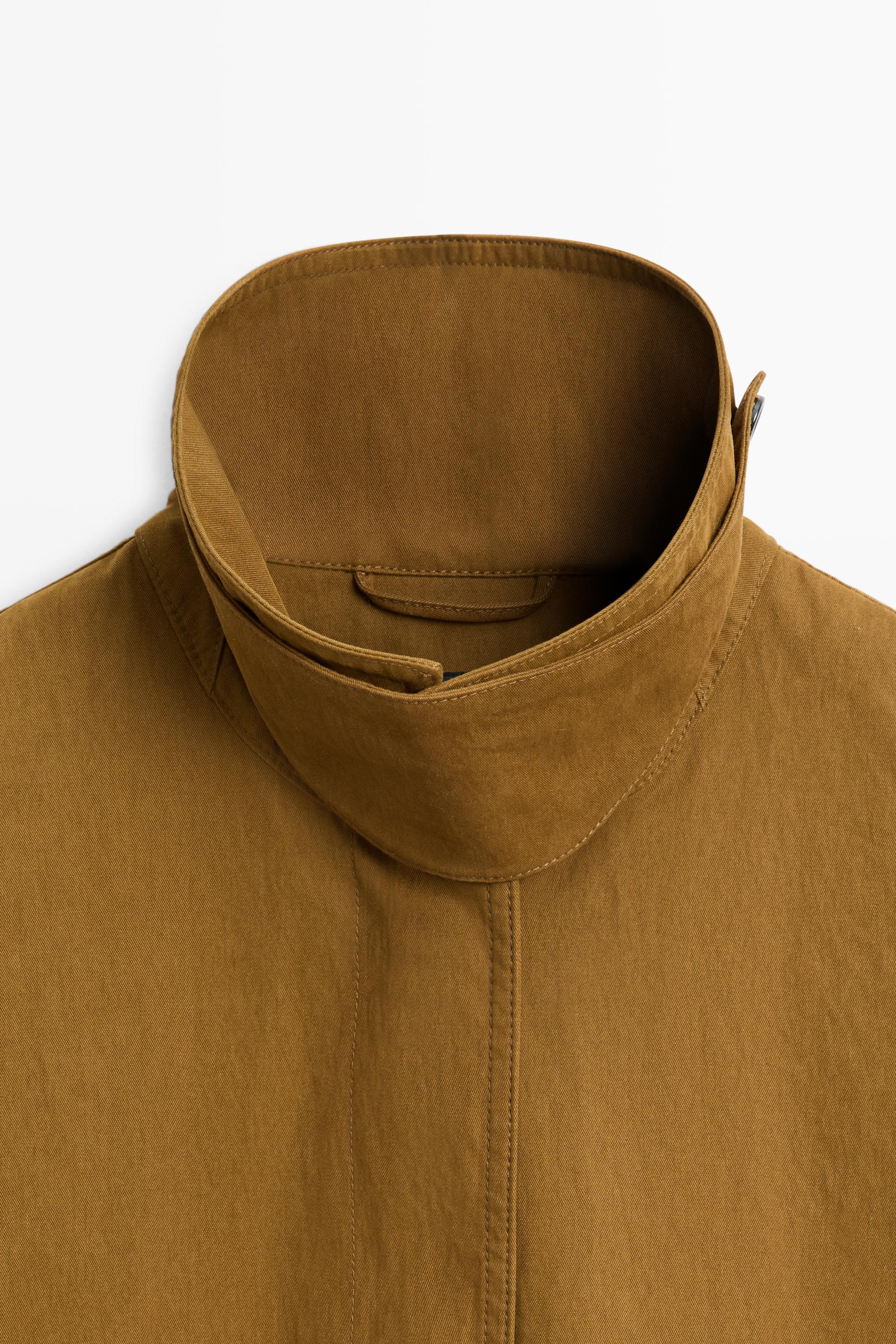 Button-tab cape jacket